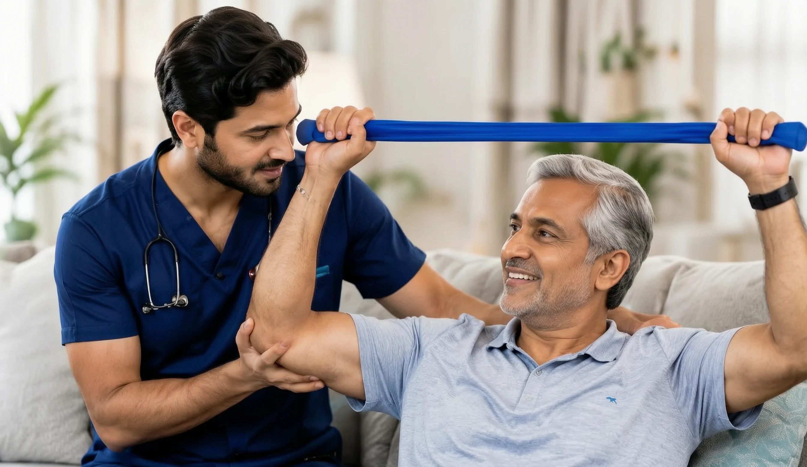 Physiotherapist supporting a patient during a resistance band exercise